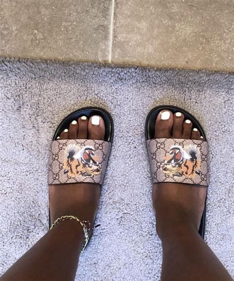 gucci lion slides|gucci slides expensive.